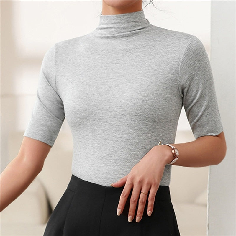 Meliora – Zwarte Coltrui Met Elegante Hoge Kraag en Flatterende Stretch Pasvorm