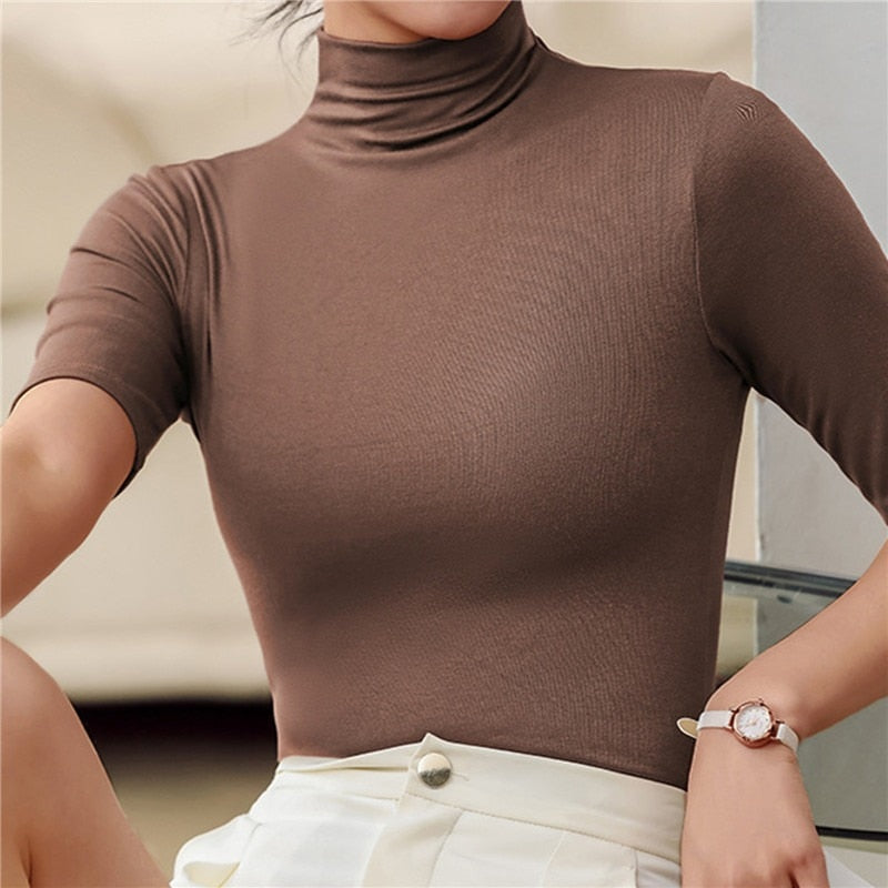 Meliora – Zwarte Coltrui Met Elegante Hoge Kraag en Flatterende Stretch Pasvorm